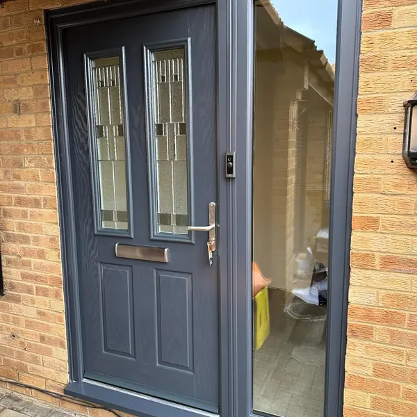 Anthracite composite front door with glazed side panel