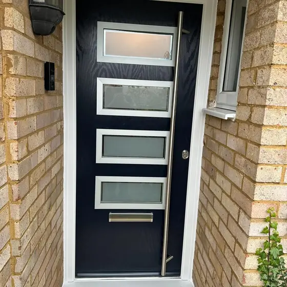 Anthracite grey contemporary composite door with horizontal glazed panels