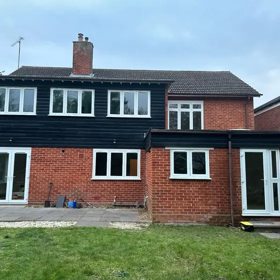 Rear elevation of a house fitted with anthracite grey windows and doors