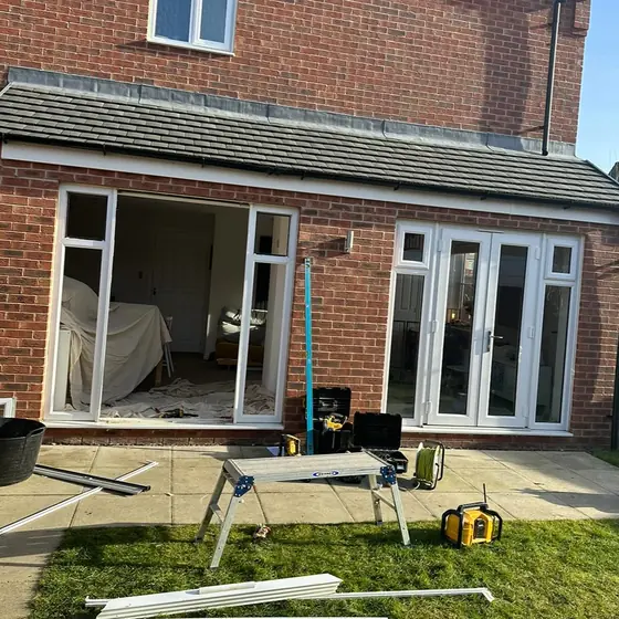White French doors and windows fitted to a rear extension